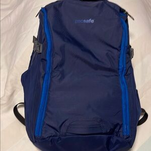 Pacsafe Dark Blue Backpack with Bright Blue Accents